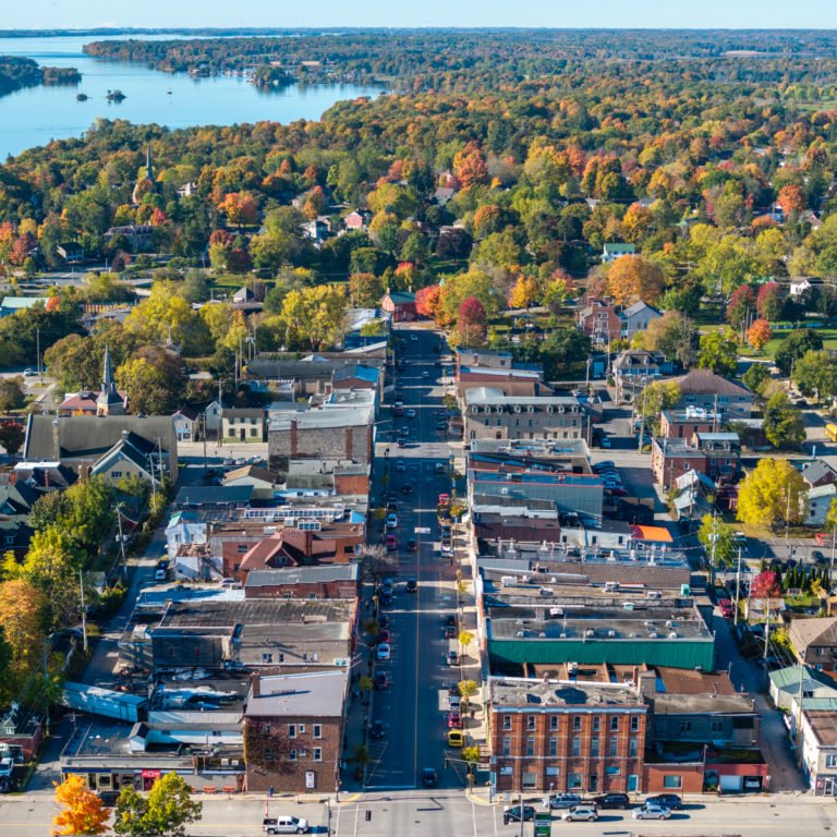 Aerial view of Gananoque, Ontario in autumn — a small Canadian town of the kind hiring through the Rural Community Immigration Pilot